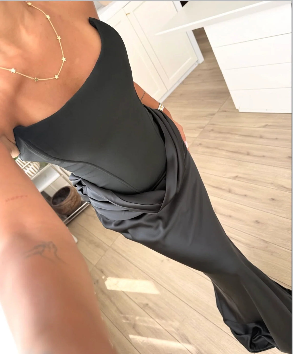 Black satin dress with corset detail